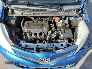 2012 Toyota Yaris L z VIN JTDKTUD32CD507510, wystawiony jako Copart lot #58441335 z przebiegiem 123 872 mil mil oraz Szkoda całkowita • Salvage title. Historia ofert i sprzedaży dostępna na DreamBid. Obrazek 11.