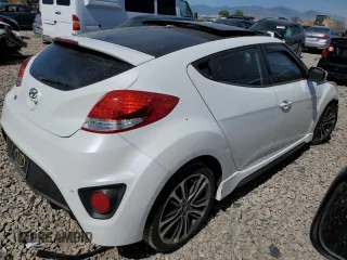 2016 Hyundai Veloster Turbo with VIN KMHTC6AE6GU302425, listed as a Copart auction lot 57547873 with 83,854 mi miles. Bid and sale history available at carsss.com. Image 3.