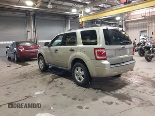 2011 Ford Escape XLT with VIN 1FMCU0D75BKB11168, listed as a IAAI auction lot 41327470 with 136,610 mi miles. Bid and sale history available at carsss.com. Image 3.