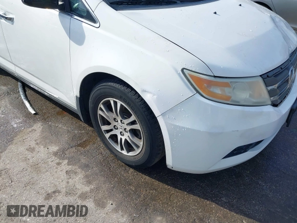 2011 Honda Odyssey EX-L with VIN 5FNRL5H6XBB059162, listed as a IAAI auction lot 42061378 with 164,317 mi miles and . Bid and sale history available at carsss.com. Image 17.