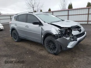 2018 Toyota RAV4 LE with VIN 2T3BFREV9JW724606, listed as a IAAI auction lot 41862028 with 98,590 mi miles. Bid and sale history available at carsss.com. Image 1.