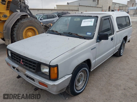 1990 Mitsubishi Mighty Max with VIN JA7FL24W6LP031144, listed as a IAAI auction lot 42152666 with 212,104 mi miles and . Bid and sale history available at DreamBid. Image 2.