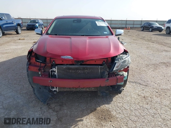 2014 Chevrolet Impala LTZ with VIN 1G1145SL0EU169876, listed as a IAAI auction lot 41696439 with 121,453 mi miles and . Bid and sale history available at DreamBid. Image 13.