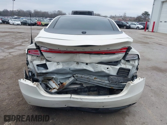 2013 Lincoln MKZ z VIN 3LN6L2GK9DR811737, wystawiony jako IAAI lot #42011896 z przebiegiem 100 669 mil mil oraz . Historia ofert i sprzedaży dostępna na DreamBid. Obrazek 17.