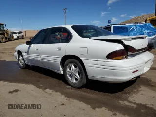 1999 Pontiac Bonneville SE z VIN 1G2HX52K3XH226172, wystawiony jako Copart lot #71655164 z przebiegiem 242 429 mil mil oraz Szkoda całkowita • Salvage title. Historia ofert i sprzedaży dostępna na DreamBid. Obrazek 2.