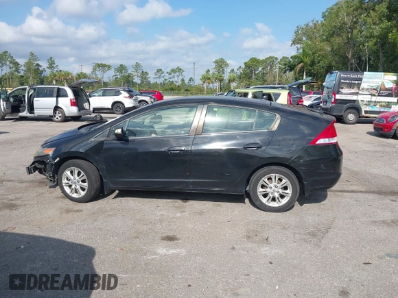 2010 Honda Insight EX with VIN JHMZE2H76AS000837, listed as a IAAI auction lot 42103333 with 146,576 mi miles and . Bid and sale history available at DreamBid. Image 14.