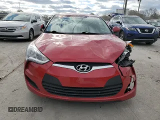 2016 Hyundai Veloster z VIN KMHTC6AD9GU302135, wystawiony jako Copart lot #81881264 z przebiegiem 167 281 mil mil oraz Szkoda całkowita • Salvage title. Historia ofert i sprzedaży dostępna na DreamBid. Obrazek 5.