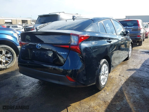 2020 Toyota Prius L Eco with VIN JTDKARFU7L3119834, listed as a IAAI auction lot 41653177 with 140,964 mi miles. Bid and sale history available at carsss.com. Image 4.