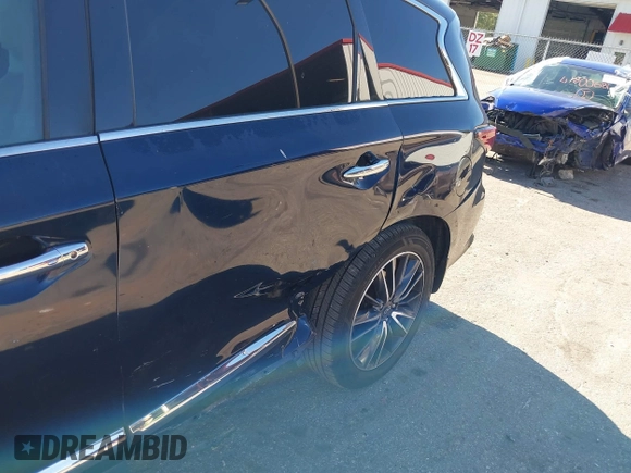 2016 Infiniti QX60 with VIN 5N1AL0MN4GC532048, listed as a IAAI auction lot 41832885 with 125,306 mi miles and . Bid and sale history available at DreamBid. Image 6.