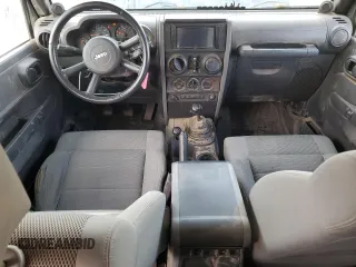 2007 Jeep Wrangler Unlimited Rubicon with VIN 1J4GA69177L100903, listed as a Copart auction lot 81321154 with 130,632 mi miles and Salvage title. Bid and sale history available at DreamBid. Image 8.