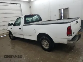 2000 Ford F-150 XL with VIN 1FTRF17L7YNB52822, listed as a Copart auction lot 43421495 with 103,753 mi miles and Salvage title. Bid and sale history available at DreamBid. Image 2.
