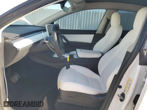 2022 Tesla Model Y Long Range with VIN 7SAYGDEE1NF339663, listed as a Copart auction lot 49771965 with 33,734 mi miles and Salvage Title. Bid and sale history available at carsss.com. Image 7.