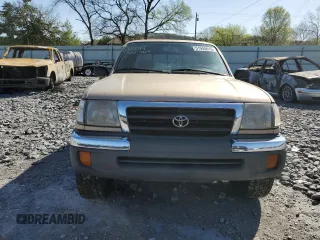 1999 Toyota Tacoma z VIN 4TAWN72N5XZ418522, wystawiony jako Copart lot #51940615 z przebiegiem 340 432 mil mil oraz Szkoda całkowita • Salvage title. Historia ofert i sprzedaży dostępna na DreamBid. Obrazek 5.