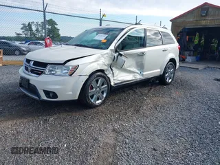 2013 Dodge Journey Crew with VIN 3C4PDDDG9DT685464, listed as a IAAI auction lot 42641982 with 155,901 mi miles and . Bid and sale history available at DreamBid. Image 20.