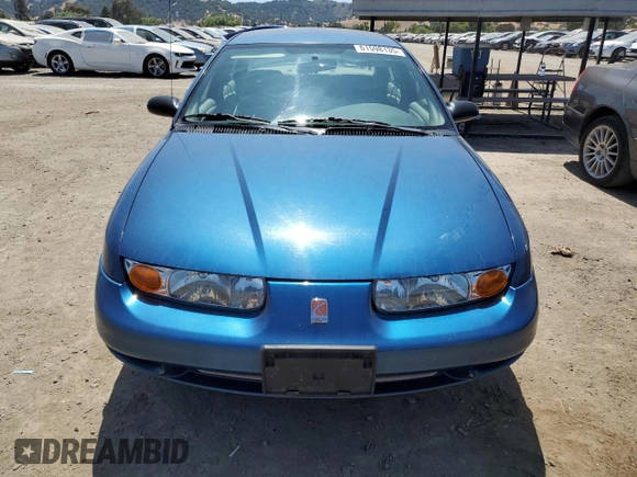 2000 Saturn SL with VIN 1G8ZK5271YZ184701, listed as a Copart auction lot 61598135 with 123,309 mi miles and Salvage title. Bid and sale history available at DreamBid. Image 5.