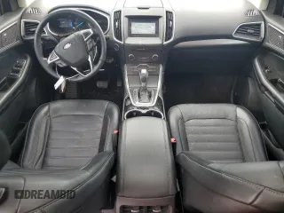 2016 Ford Edge SEL z VIN 2FMPK3J90GBB51657, wystawiony jako Copart lot #57895715 z przebiegiem 104 797 mil mil oraz Tytuł czysty. Historia ofert i sprzedaży dostępna na DreamBid. Obrazek 8.