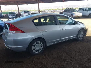 2010 Honda Insight LX z VIN JHMZE2H53AS007016, wystawiony jako IAAI lot #42096274 z przebiegiem 173 519 mil mil oraz . Historia ofert i sprzedaży dostępna na DreamBid. Obrazek 4.