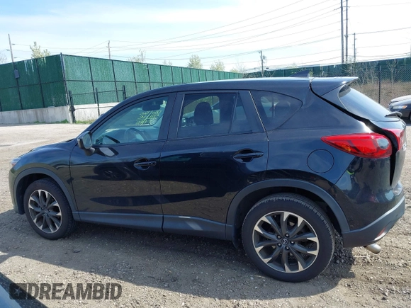 2016 Mazda CX-5 Grand Touring with VIN JM3KE4DY8G0639570, listed as a IAAI auction lot 42098512 with 126,541 mi miles and . Bid and sale history available at carsss.com. Image 14.