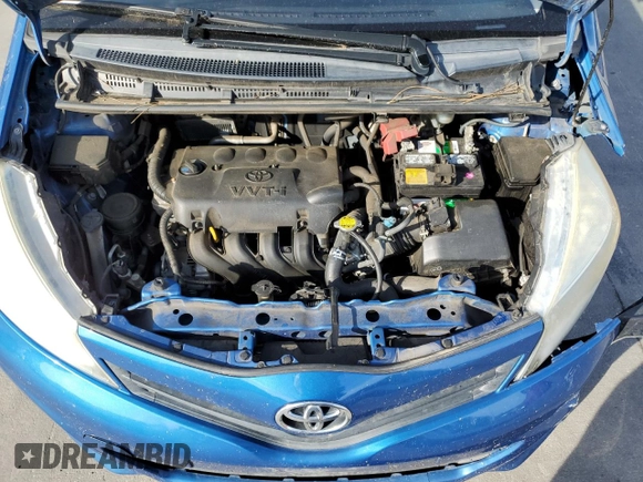 2012 Toyota Yaris L z VIN JTDKTUD32CD507510, wystawiony jako Copart lot #58441335 z przebiegiem 123 872 mil mil oraz Szkoda całkowita • Salvage title. Historia ofert i sprzedaży dostępna na DreamBid. Obrazek 11.