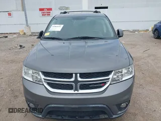 2013 Dodge Journey SXT with VIN 3C4PDDBGXDT650886, listed as a IAAI auction lot 41864331 with 224,579 mi miles and . Bid and sale history available at DreamBid. Image 12.