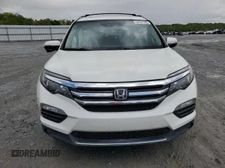 2017 Honda Pilot Touring with VIN 5FNYF6H91HB092062, listed as a Copart auction lot 52761765 with 141,750 mi miles and Salvage Title. Bid and sale history available at DreamBid. Image 5.