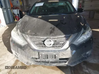2016 Nissan Altima SV with VIN 1N4AL3AP6GC272379, listed as a IAAI auction lot 41524317 with 104,078 mi miles and . Bid and sale history available at DreamBid. Image 12.