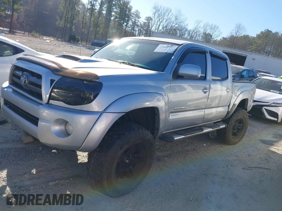 2009 Toyota Tacoma z VIN 5TELU42N09Z596810, wystawiony jako IAAI lot #41673552 z przebiegiem 169 044 mil mil oraz . Historia ofert i sprzedaży dostępna na DreamBid. Obrazek 14.
