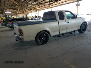 1999 Ford F-150 with VIN 1FTZX172XXKA26359, listed as a Copart auction lot 52215805 with 268,403 mi miles and Salvage title. Bid and sale history available at DreamBid. Image 3.