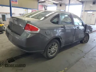 2009 Ford Focus SE with VIN 1FAHP35N39W235044, listed as a Copart auction lot 52953995 with 233,367 mi miles and Salvage Title. Bid and sale history available at carsss.com. Image 3.