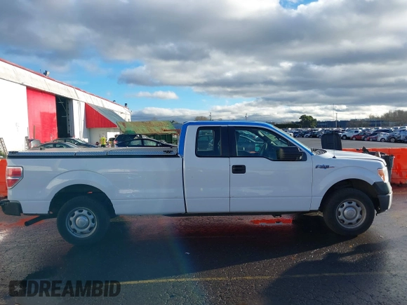 2014 Ford F-150 XL with VIN 1FTFX1CF4EKG53325, listed as a IAAI auction lot 41060015 with 216,554 mi miles. Bid and sale history available at carsss.com. Image 13.