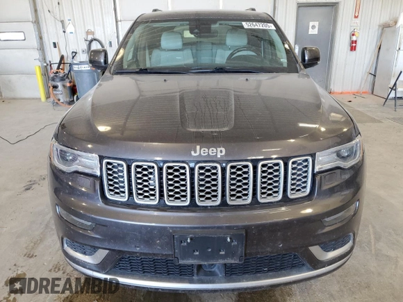 2017 Jeep Grand Cherokee Summit with VIN 1C4RJFJT4HC723876, listed as a Copart auction lot 52647205 with 97,412 mi miles and Salvage title. Bid and sale history available at DreamBid. Image 5.