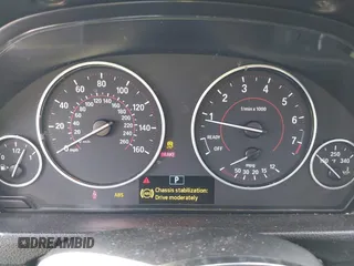 2015 BMW 3 Series 328i with VIN WBA3A5C55FF609490, listed as a IAAI auction lot 42006008 with 110,239 mi miles. Bid and sale history available at carsss.com. Image 7.