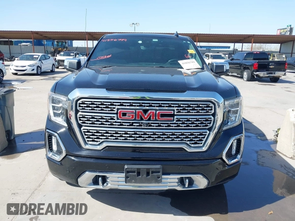 2020 GMC Sierra 1500 Denali with VIN 1GTU9FEL6LZ173499, listed as a IAAI auction lot 41856799 with 77,723 mi miles and . Bid and sale history available at DreamBid. Image 12.