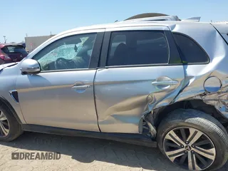 2021 Mitsubishi Outlander SE z VIN JA4APVAU3MU018743, wystawiony jako IAAI lot #42002286 z przebiegiem 97 069 mil mil oraz . Historia ofert i sprzedaży dostępna na DreamBid. Obrazek 14.
