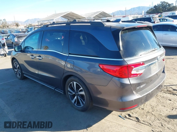 2018 Honda Odyssey Elite with VIN 5FNRL6H91JB052289, listed as a IAAI auction lot 41336068 with 94,685 mi miles and . Bid and sale history available at DreamBid. Image 3.