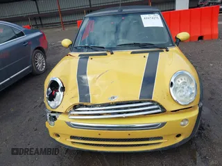 2007 MINI Convertible with VIN WMWRF33507TG16661, listed as a IAAI auction lot 41674275 with 133,838 mi miles and . Bid and sale history available at DreamBid. Image 12.
