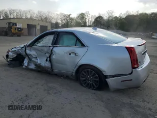 2012 Cadillac CTS Luxury with VIN 1G6DG5E50C0100783, listed as a Copart auction lot 54704325 with 145,842 mi miles and Salvage title. Bid and sale history available at DreamBid. Image 2.