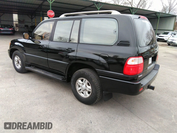 2000 Lexus LX 470 with VIN JT6HT00W8Y0100087, listed as a IAAI auction lot 41762294 with 274,720 mi miles and . Bid and sale history available at carsss.com. Image 3.