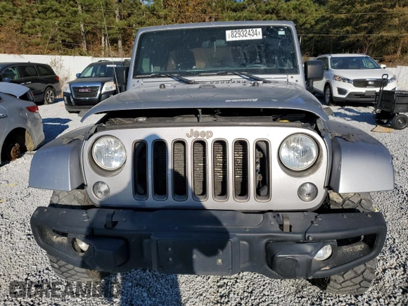 2018 Jeep Wrangler JK Unlimited Sport S with VIN 1C4BJWDG2JL871448, listed as a Copart auction lot 82932434 with 125,144 mi miles and Clean Title. Bid and sale history available at carsss.com. Image 5.
