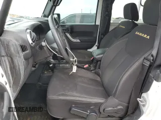 2013 Jeep Wrangler Sahara with VIN 1C4AJWBGXDL579341, listed as a Copart auction lot 55970815 with 105,961 mi miles and Salvage title. Bid and sale history available at DreamBid. Image 7.