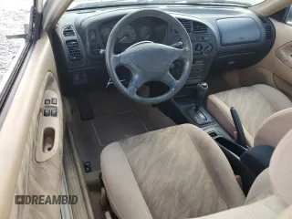 1997 Mitsubishi Mirage LS z VIN JA3AY31C1VU009019, wystawiony jako Copart lot #74227544 z przebiegiem 243 967 mil mil oraz Szkoda całkowita • Salvage title. Historia ofert i sprzedaży dostępna na DreamBid. Obrazek 8.