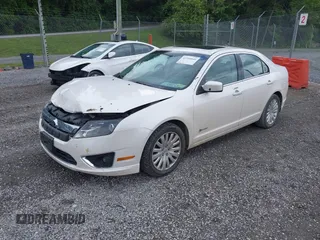 2010 Ford Fusion Hybrid with VIN 3FADP0L30AR200029, listed as a IAAI auction lot 42394846 with 192,634 mi miles and . Bid and sale history available at DreamBid. Image 21.