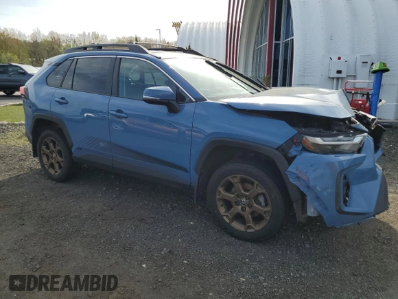 2023 Toyota RAV4 Hybrid XLE with VIN 2T3UWRFV1PW151099, listed as a Copart auction lot 54899775 with 83,437 mi miles and Salvage title. Bid and sale history available at DreamBid. Image 4.