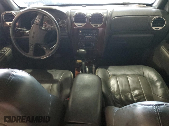2004 GMC Envoy SLT with VIN 1GKET16S146222288, listed as a Copart auction lot 49316405 with 210,424 mi miles and Salvage Title. Bid and sale history available at DreamBid. Image 8.