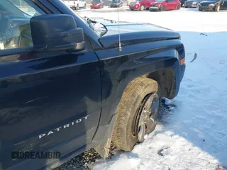 2014 Jeep Patriot Latitude with VIN 1C4NJPFAXED681859, listed as a IAAI auction lot 41271373 with 173,529 mi miles and . Bid and sale history available at DreamBid. Image 18.