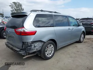 2015 Toyota Sienna XLE with VIN 5TDYK3DC1FS611521, listed as a IAAI auction lot 42136356 with 102,734 mi miles. Bid and sale history available at carsss.com. Image 4.