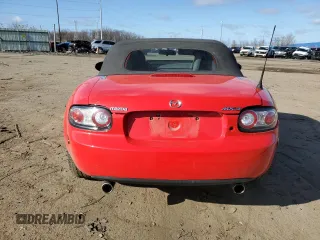 2006 Mazda MX-5 Miata Touring z VIN JM1NC25F360110572, wystawiony jako Copart lot #50555765 z przebiegiem 166 785 mil mil oraz Czysty tytuł • Clean title. Historia ofert i sprzedaży dostępna na DreamBid. Obrazek 6.