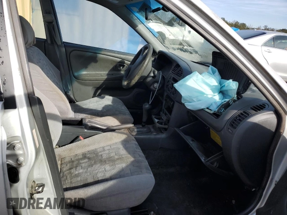 1998 Mitsubishi Mirage DE with VIN JA3AY26A3WU041117, listed as a Copart auction lot 88280675 with 213,243 mi miles and Salvage title. Bid and sale history available at DreamBid. Image 7.