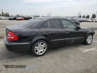 2003 Mercedes-Benz E-Class 5.0L with VIN WDBUF70J53A146263, listed as a Copart auction lot 62768664 with 73,790 mi miles and Salvage Title. Bid and sale history available at carsss.com. Image 3.