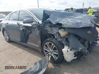 2014 Lincoln MKZ with VIN 3LN6L2GK3ER807586, listed as a IAAI auction lot 42426125 with 198,281 mi miles and . Bid and sale history available at DreamBid. Image 1.